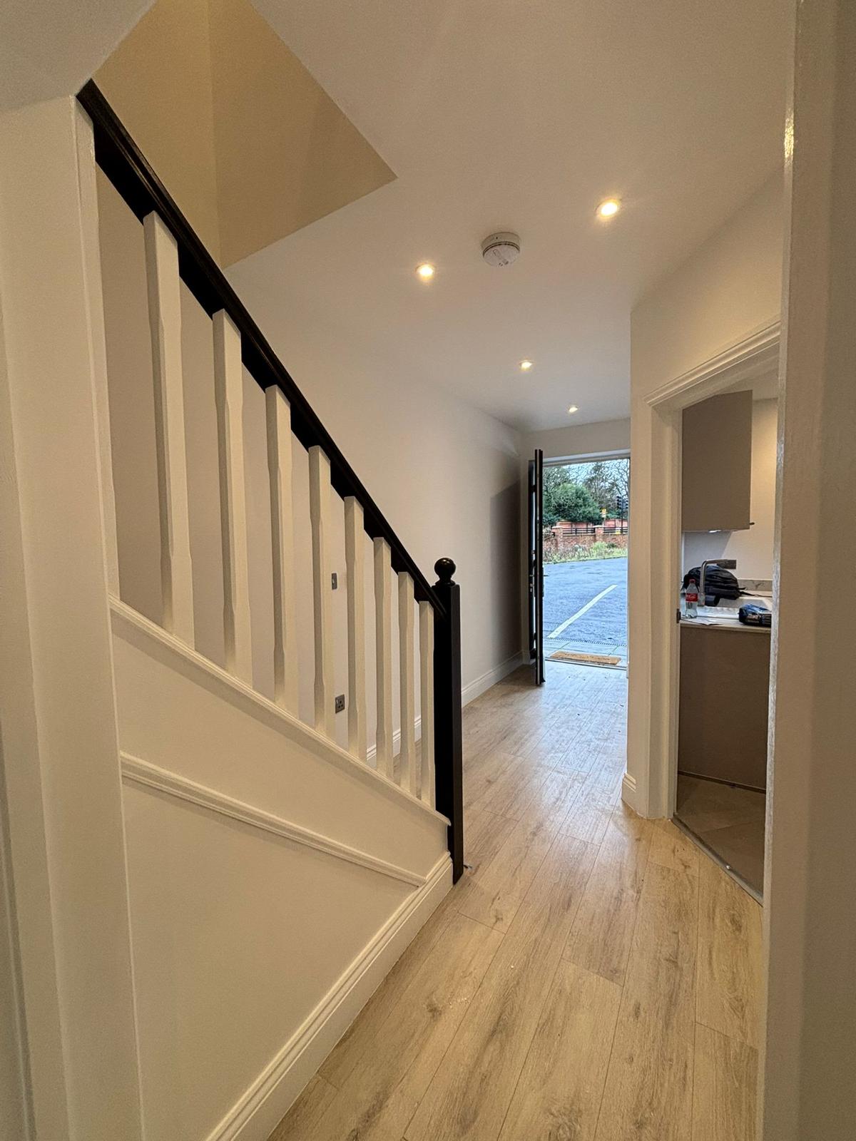 modern hallway refurbishment in Lewisham two bedroom house by ColorLux decorators